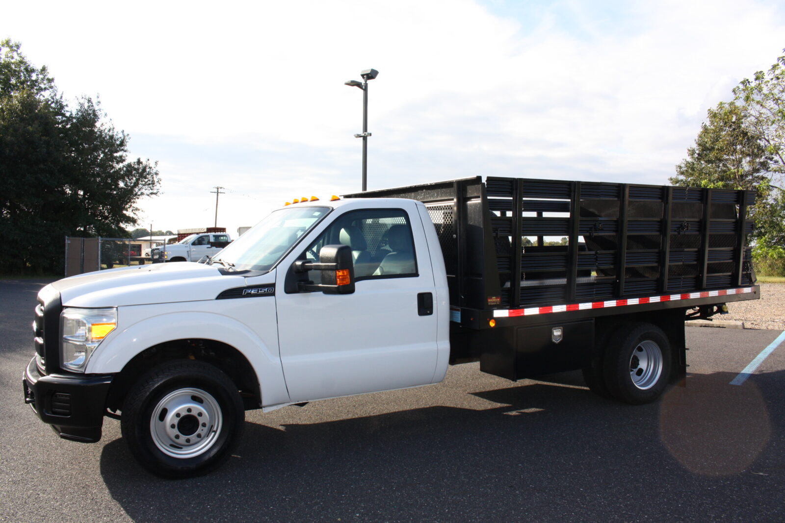 IMG_1115 2016 FORD F350 12FT STAKE BODY TRUCK